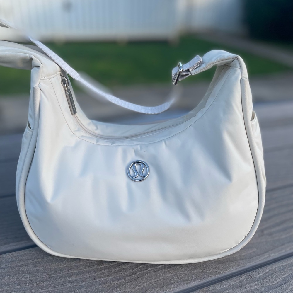 lululemon athletica Cream Crescent Hobo Bag with Silver Logo
